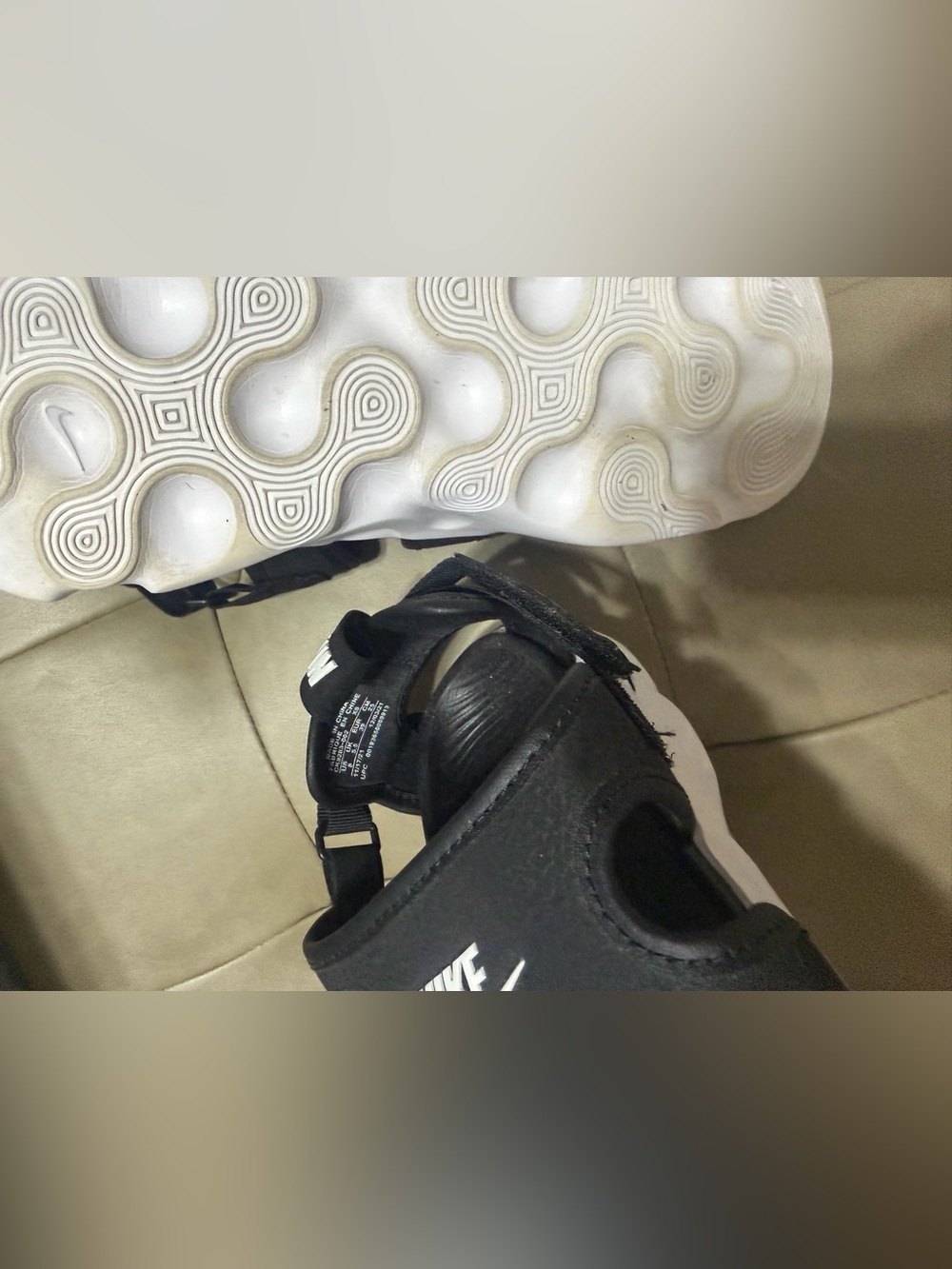 Nike Black and White women’s Adjustable Strap Sandals